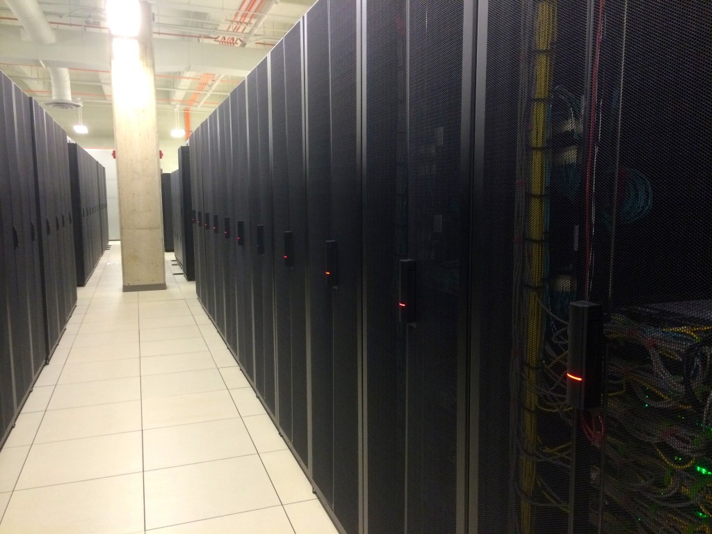 Here is a row of servers provided by clients which are colocated to the Data Center. There servers contain sensitive data, so they can only be accessed by the client using the RFID locks on each rack (the red lights).